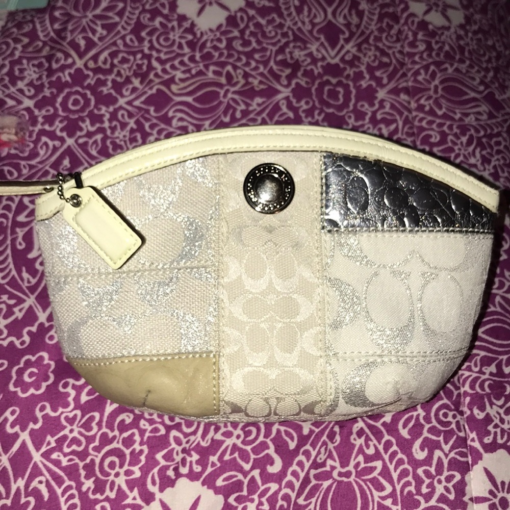 Coach cosmetics case.